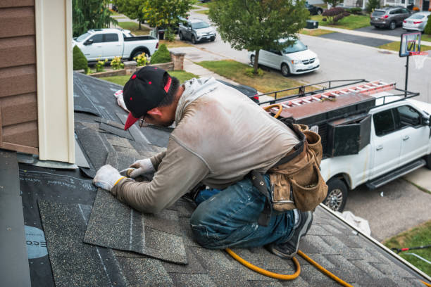 Professional Storm Damage Roof Repair technician working in Valencia, CA